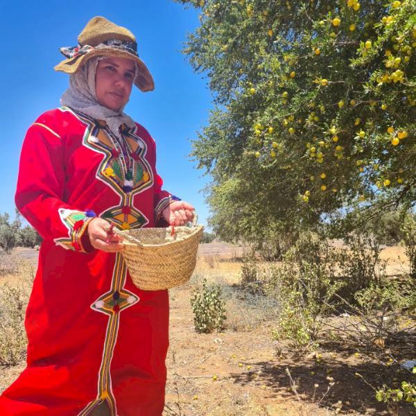 Hadria, a member of the Cooperative Feminine Mogador shows us freshly harvested argan fruit ready for processing © TRAFFIC